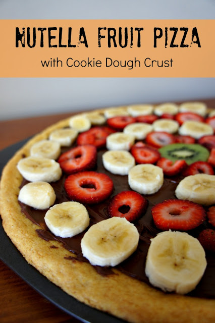 Nutella Fruit Pizza...tastes as good as it looks AND it only takes about 25 mintues from start to finish to make!