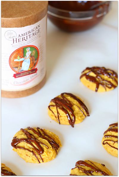 Soft and chewy pumpkin cookies with drizzled dark chocolate