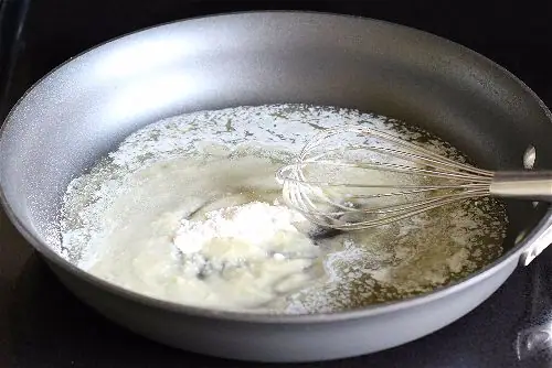 whisk in one tablespoon of flour at a time for your roux