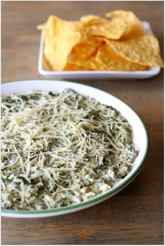 Creamy, cheesy slow cooker spinach dip with tortilla chips