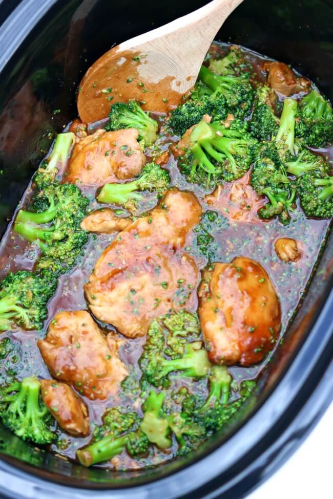Instant Pot Honey Garlic Chicken and Rice--an easy Asian pressure cooker recipe for tender chicken thighs in a soy sauce, honey, and garlic sauce. Plus the rice is cooked at the same time and in the same pot as the chicken. Add in some broccoli and you have a complete dinner!