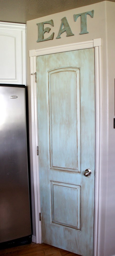 painted aqua pantry door...so easy it only took me a couple of hours