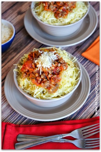 Recipe for Slow Cooker Meat and Veggie Spaghetti Sauce served over Spaghetti Squash