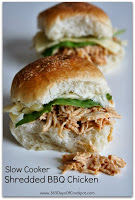 An easy 5 ingredient recipe for Slow Cooker Shredded BBQ Chicken.  Serve the tender meat on slider buns, salad or even pizza!  Easy dinner that the whole family will love.  #crockpot #slowcooker 