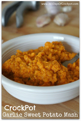Recipe for Garlic Sweet Potato Mash made in the Crockpot...super easy but totally flavorful.  Even those who don't like sweet potatoes will loves these mashed potatoes! 