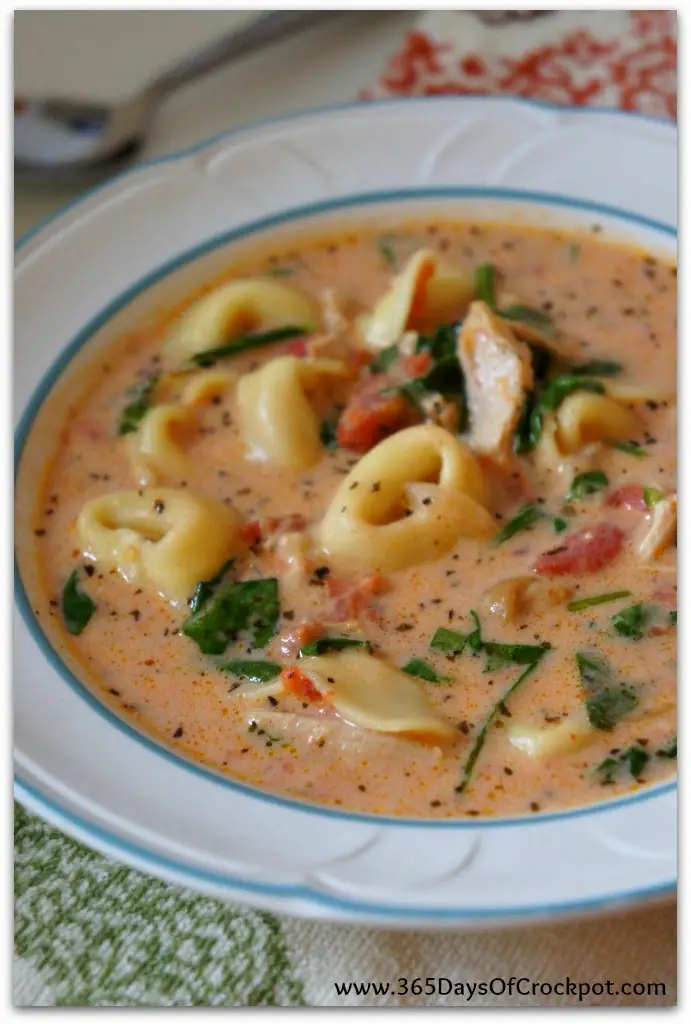 Tomato Parmesan soup with tortellini, spinach and chicken. My new favorite soup!!