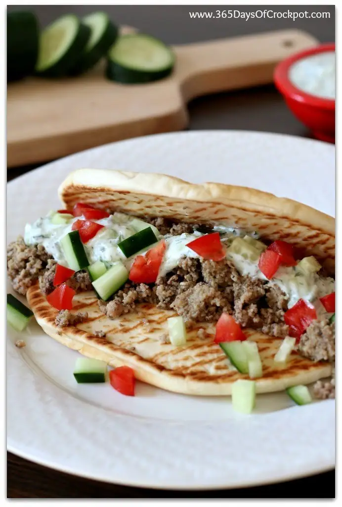 These slow cooker Greek ground turkey pitas with tzatziki sauce have all the fun flavors of gyros but with ground turkey meat instead of lamb. Why not mix up taco night and make these Greek "tacos" instead of plain old regular tacos. This recipe is so easy that anybody--even your kids--can make it!