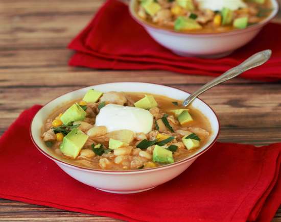 White bean chowder with corn and avocados and chipotles