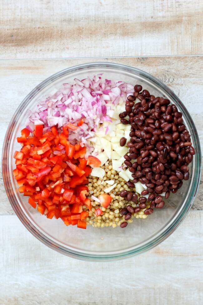 best summer salad! red onions, black beans, jicama, red peppers and wheat berries all with a lime dressing