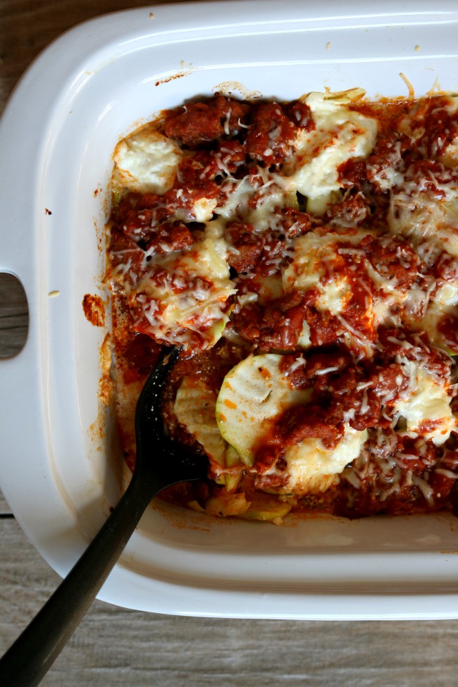 Slow Cooker Zucchini Noodle Lasagna: an easy recipe for a red sauce lasagna with gooey cheese, spicy sausage and sliced zucchini that is used for the noodles all made in your crockpot!