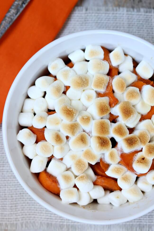 Slow Cooker Marshmallow Sweet Potatoes: a traditional holiday side dish made in your slow cooker to free up oven and stovetop space for all the other food that you'll be making!