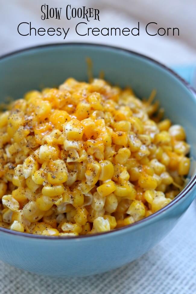 Slow Cooker Cheesy Creamed Corn: an easy slow cooker recipe for a indulgent, cheesy and creamy corn dish that is perfect for a special holiday meal. 