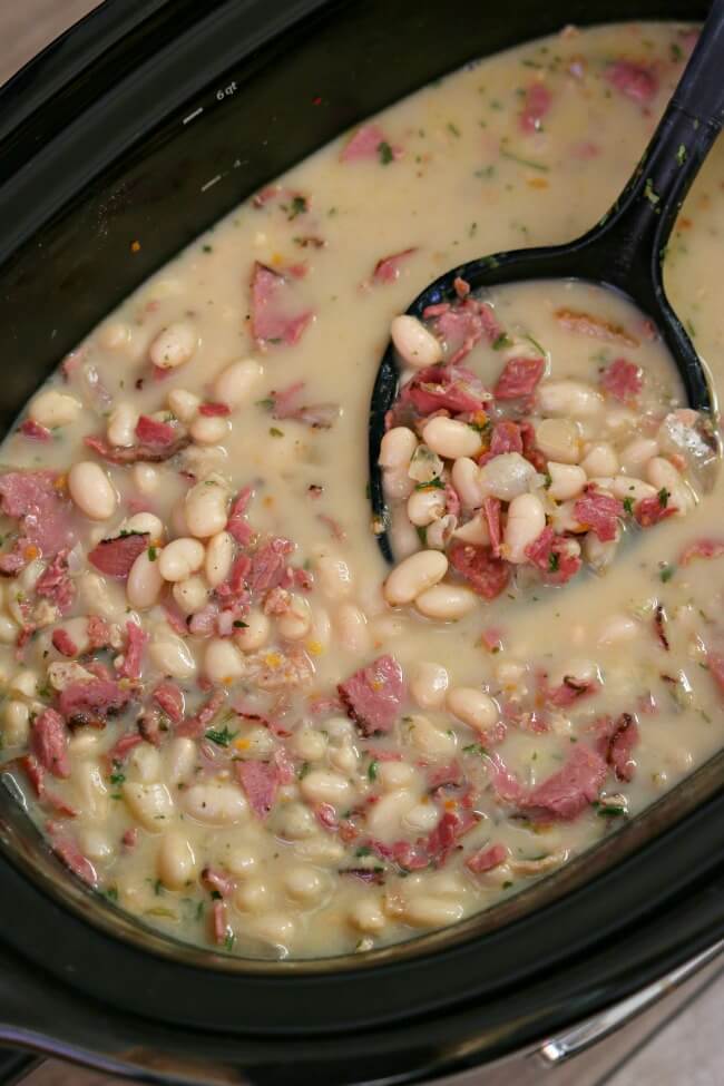 Slow Cooker White Bean and Pastrami Soup--an easy recipe for a creamy crockpot soup made with dried white beans, chopped vegetables, flavorful seasonings and salty pastrami (or you can use ham). 