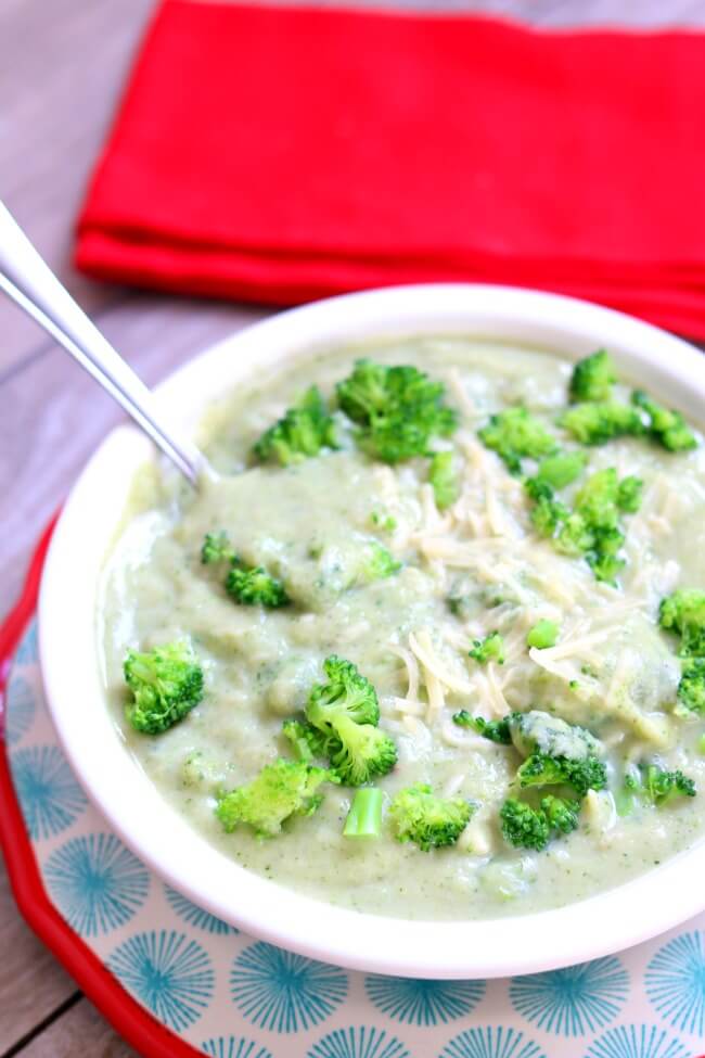 Slow Cooker Creamy Cauliflower Broccoli Soup--a healthy and creamy slow cooker soup with pureed and seasoned cauliflower and bright green broccoli florets with a bit of cream and Parmesan cheese. 
