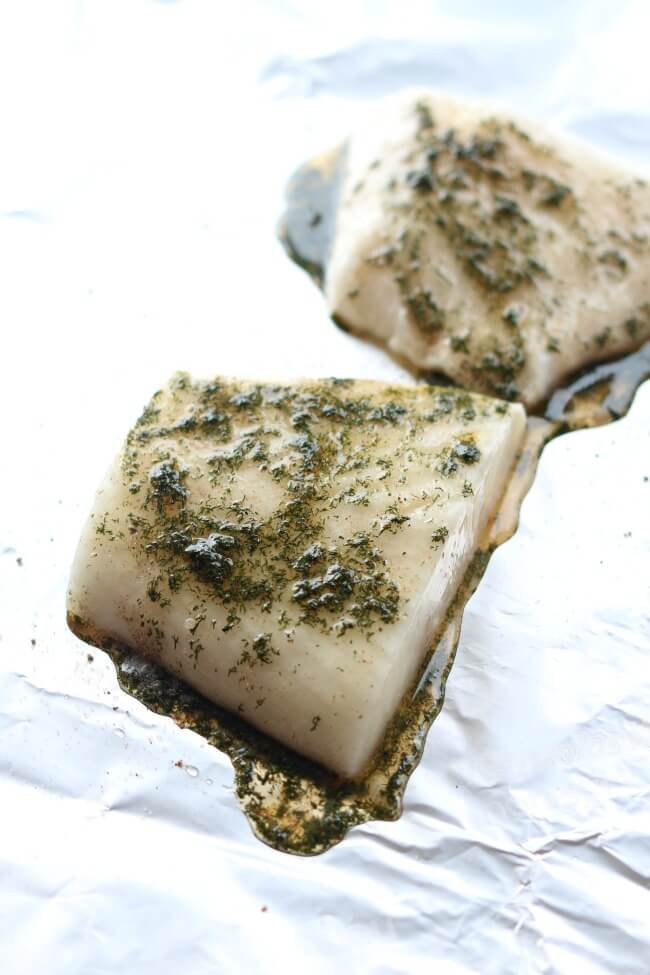 Slow Cooker Lemon Dill Halibut --light and flaky halibut with lemon and dill made in your slow cooker inside a foil packet. No fishy smelling house and super easy clean up makes this a winning way to make fish. 