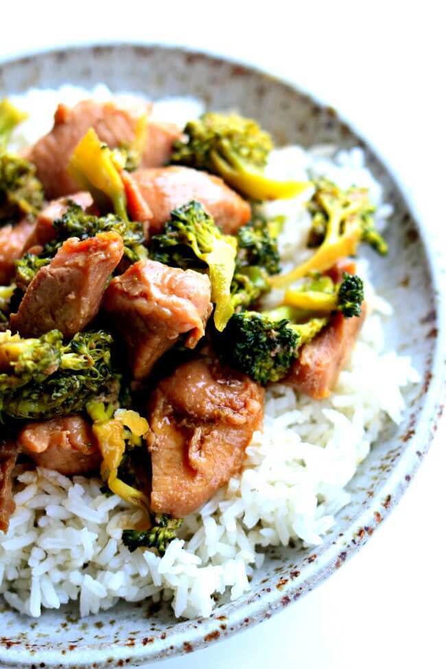 Slow Cooker Pork and Broccoli--you've all heard of beef and broccoli but I'm mixing it up today by using pork sirloin instead. This crockpot recipe is super easy but it will make you feel like you're eating at your favorite Chinese restaurant. Tender pieces of pork and a super savory sauce with semi-cooked broccoli all go together nicely over white rice. 