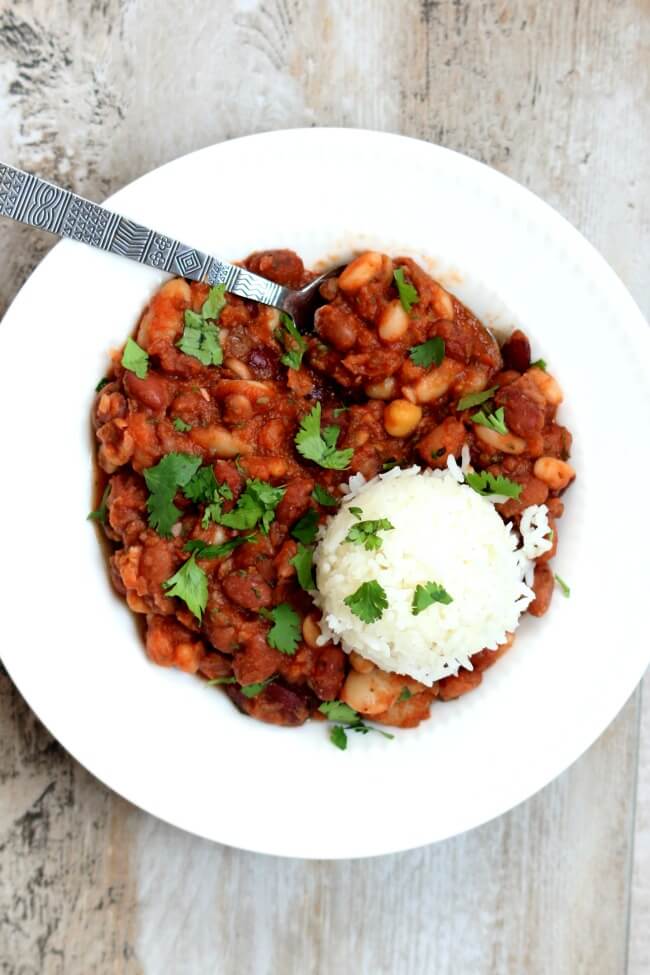 Cajun Beans and Rice--a meatless, saucy, cajun seasoned dish that uses dried beans in the slow cooker or on the stovetop. A perfect dish for Mardi Gras. 