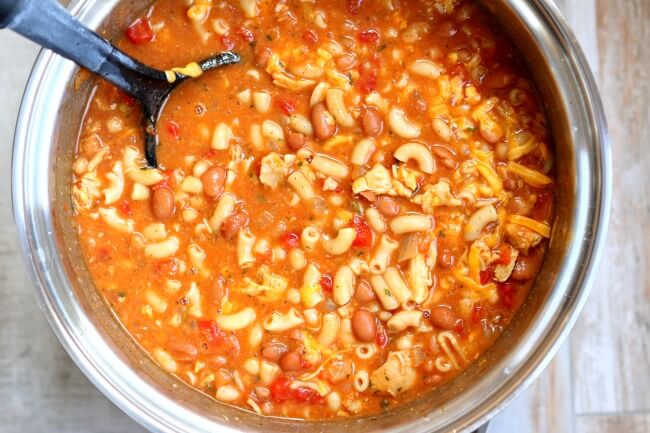 Slow Cooker Chicken Chili Mac--an easy one pot recipe for cheesy chili mac made with tender bites of chicken and two kinds of beans. 