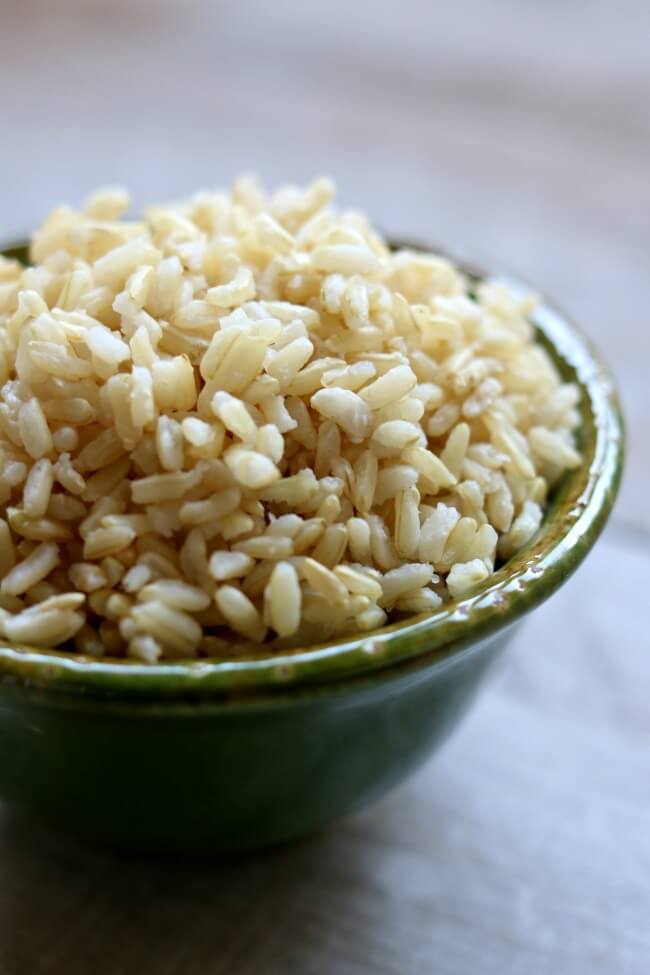 Instant Pot Brown Rice Recipe--perfectly cooked brown rice without any fuss made in your pressure cooker in a total of 40 minutes. 