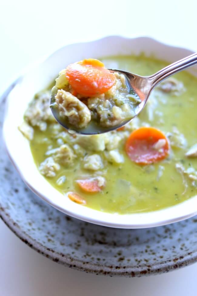 Instant Pot Pesto Chicken Rice Soup--a flavorful soup with tender bites of chicken, chewy brown rice and flavorful basil pesto made in minutes in your pressure cooker. 