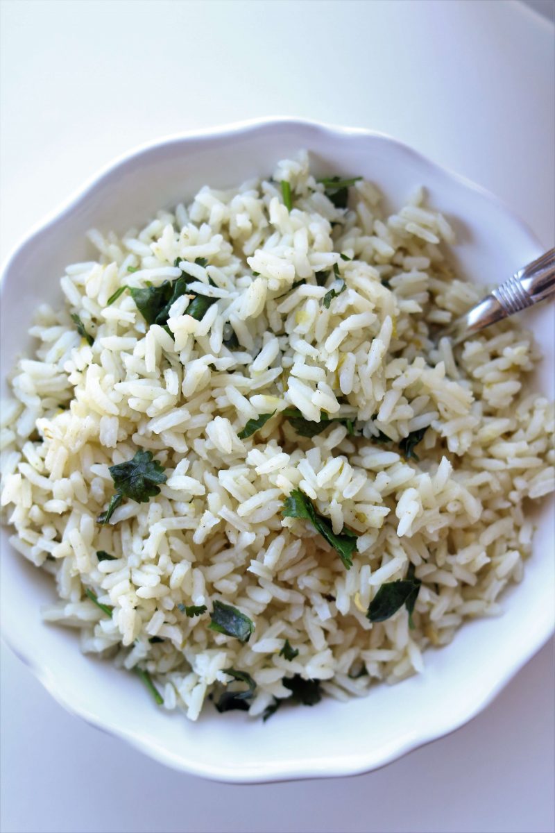 Instant Pot Cafe Rio Cilantro Lime Rice--this quickly cooked seasoned rice made in you pressure cooker is just like Cafe Rio's and it makes the perfect addition to any Mexican dish for dinner. 