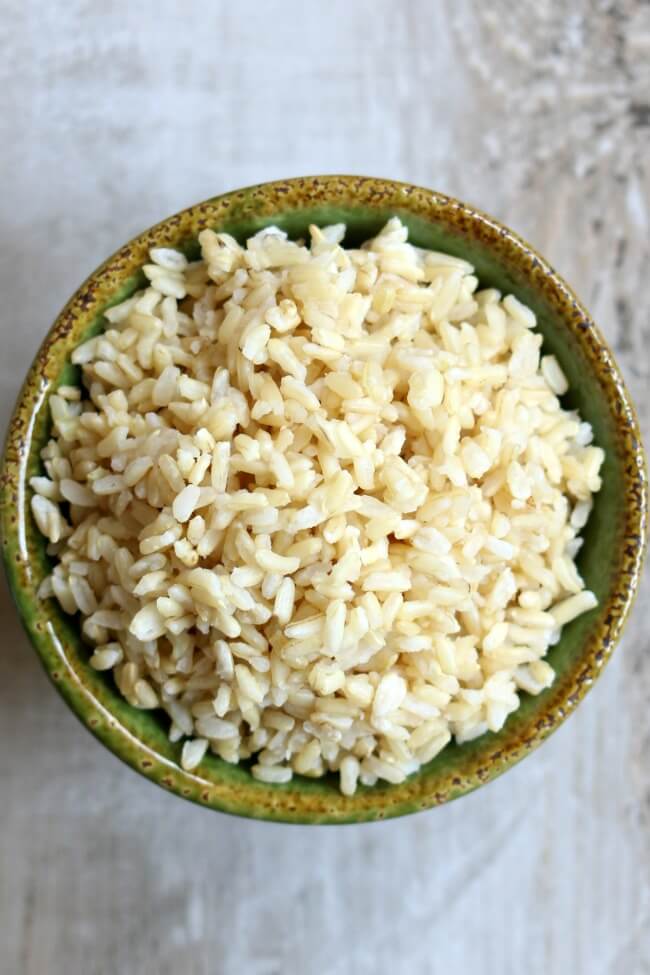 Instant Pot Brown Rice Recipe--perfectly cooked brown rice without any fuss made in your pressure cooker in a total of 40 minutes. 
