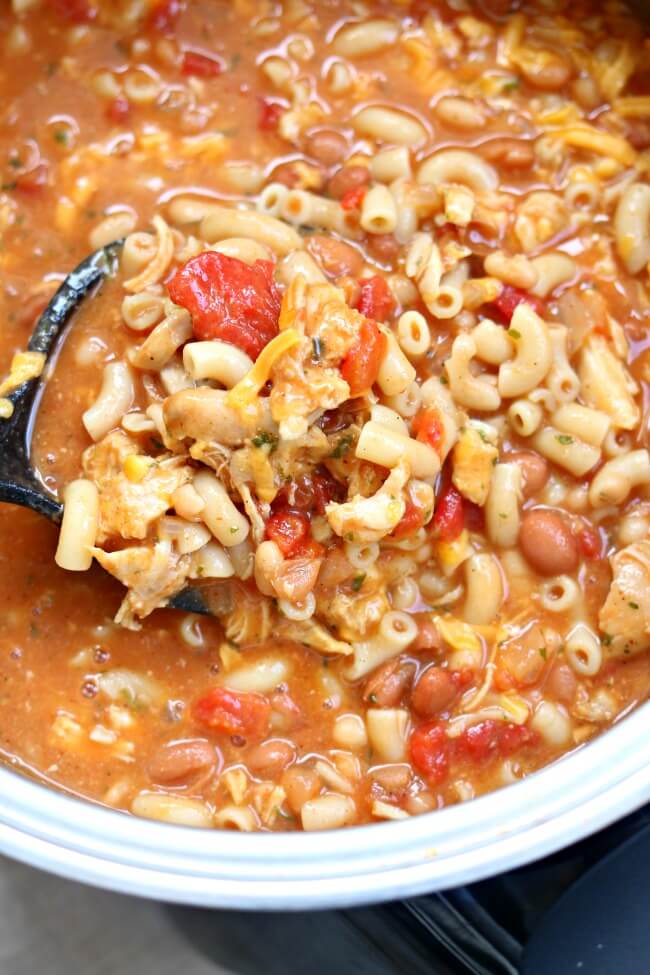 Slow Cooker Chicken Chili Mac--an easy one pot recipe for cheesy chili mac made with tender bites of chicken and two kinds of beans. A perfect easy weeknight meal. 