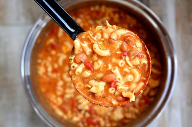 Slow Cooker Chicken Chili Mac--an easy one pot recipe for cheesy chili mac made with tender bites of chicken and two kinds of beans. A perfect easy weeknight meal. 