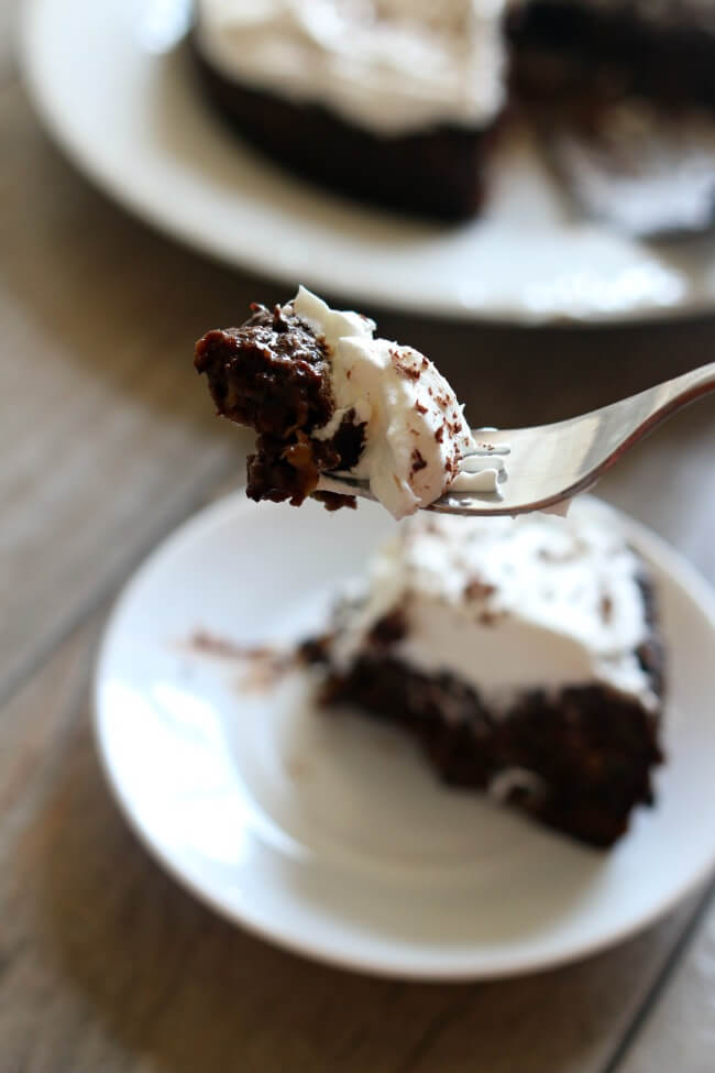 Instant Pot Chocolate Zucchini Cake--an ultra moist, dense and super chocolatey cake made in your electric pressure cooker with your favorite summer vegetable, zucchini. 