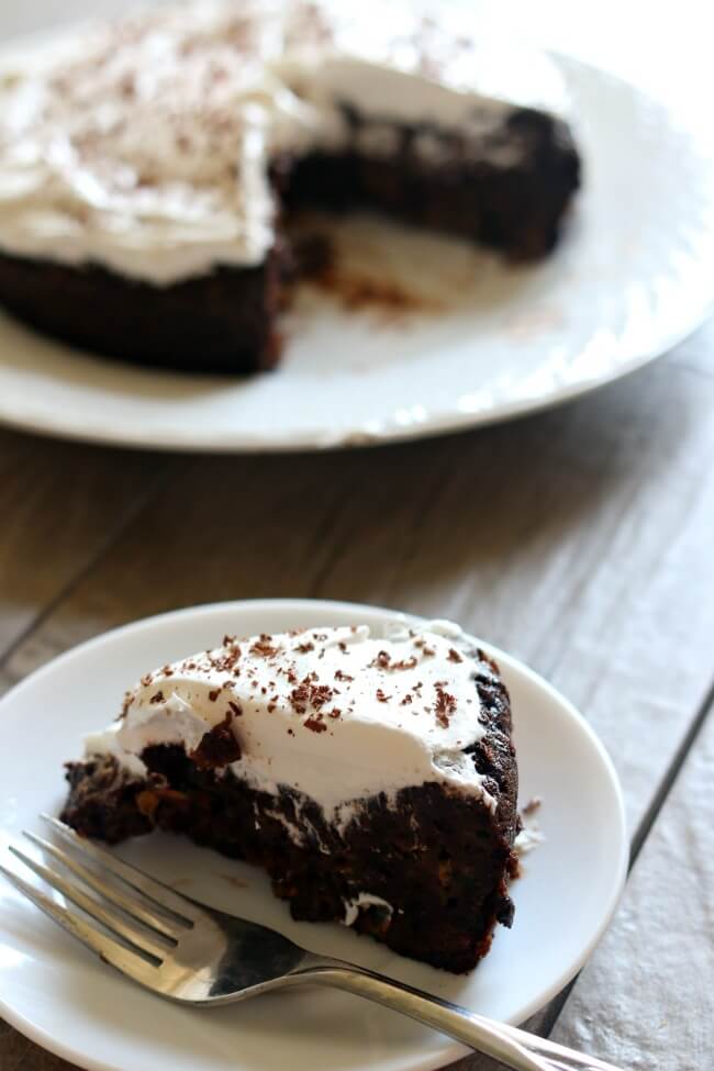 Instant Pot Chocolate Zucchini Cake--an ultra moist, dense and super chocolatey cake made in your electric pressure cooker with your favorite summer vegetable, zucchini. 