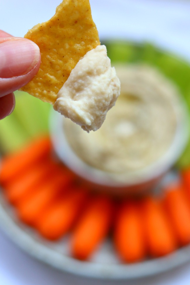 Instant Pot White Bean Garlic Hummus--dried white beans are cooked in just a few minutes in your electric pressure cooker and then pureed with fresh lemon juice, garlic and olive oil to make a simple but delicious dip.