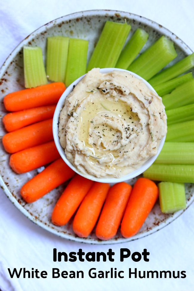 Instant Pot White Bean Garlic Hummus--dried white beans are cooked in just a few minutes in your electric pressure cooker and then pureed with fresh lemon juice, garlic and olive oil to make a simple but delicious dip.
