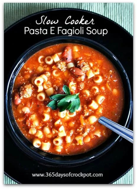 Slow Cooker Pasta e Fagioli Soup--your favorite soup from Olive Garden made at home in your slow cooker. White and red beans, ground beef,  tomatoes and pasta in a savory broth. 