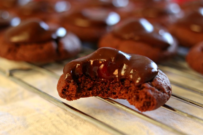 Buried Chocolate Cherry Cookies--we've been making these cookies in my family at Christmastime for years. They are so festive and delicious. They are ultra chocolatey and have a bit of a cherry flavor too.