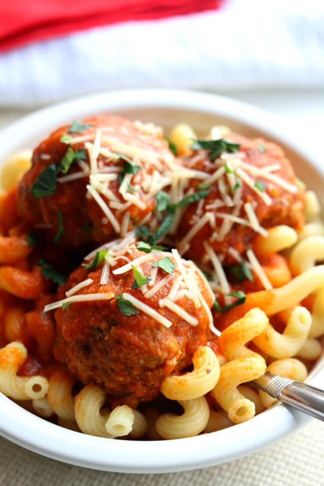 Instant Pot Meatballs--you can make meatballs in your electric pressure cooker! They're tender and taste great served over pasta and sprinkled with parmesan cheese. This is a hands off recipe that takes just a few minutes to cook. 