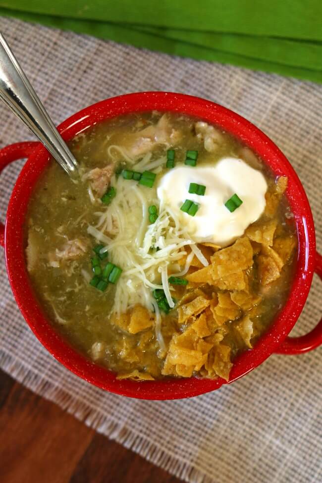 Instant Pot White Chicken Chili--this is a quick to make chili (only 5 minutes of pressure cooking time) that tastes like it's been simmering all day. You can make this recipe with uncooked chicken or cooked chicken or turkey.
