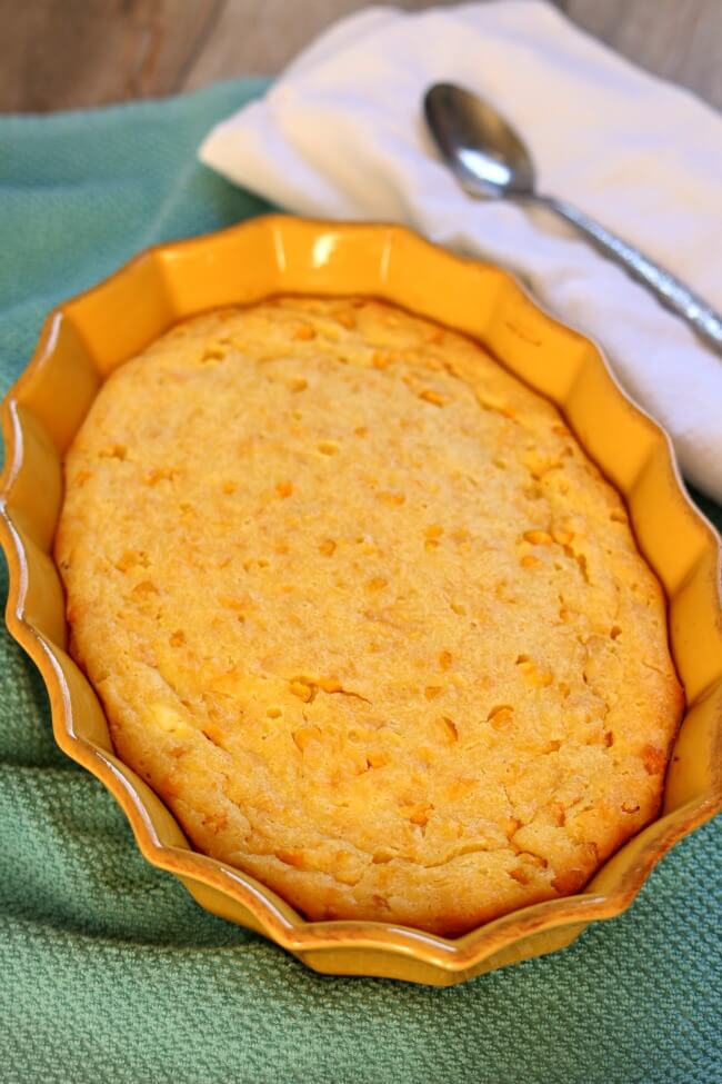Sweet Corn Spoon Bread--a perfect Thanksgiving side dish! Sweet corn spoon bread is a southern dish that is a cross between corn bread and a sweet dessert. It's more like a pudding than a bread. It's so soft, it can be served and eaten with a spoon.