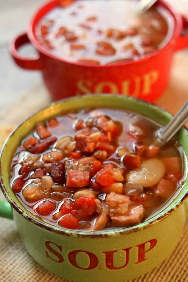 Instant Pot 15 Bean Soup--the classic 15 bean and ham soup recipe made in your electric pressure cooker in less than an hour. With just a handful of ingredients you'll have a hearty and healthy pot of soup in no time. 