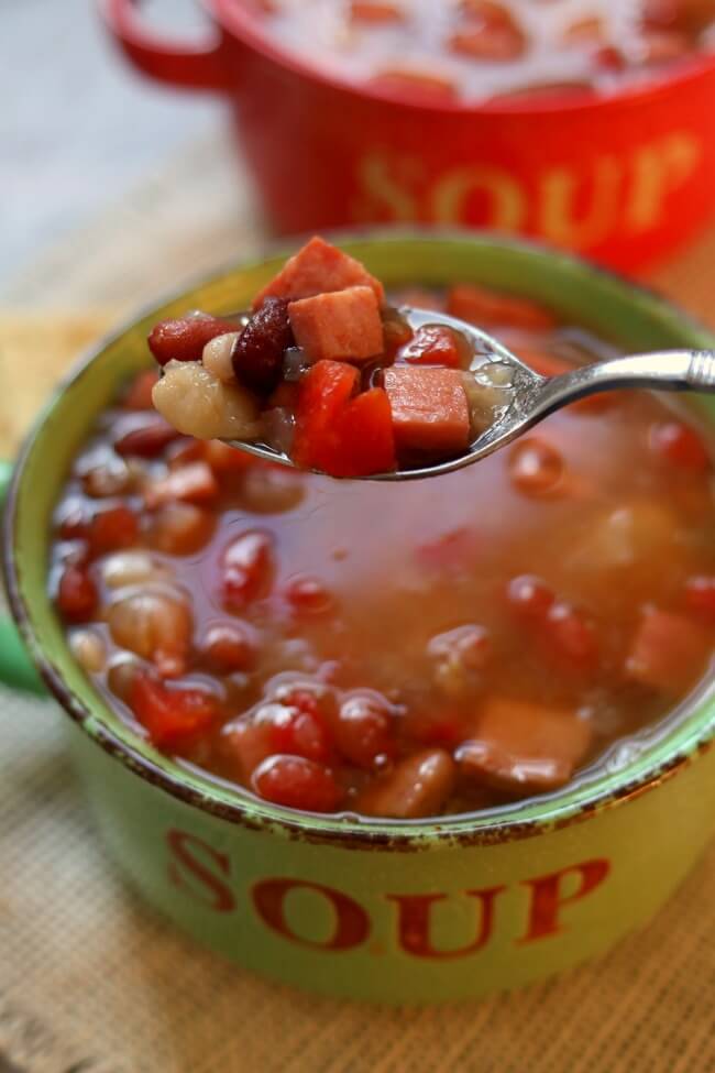 Instant Pot 15 Bean Soup--the classic 15 bean and ham soup recipe made in your electric pressure cooker in less than an hour. With just a handful of ingredients you'll have a hearty and healthy pot of soup in no time. 
