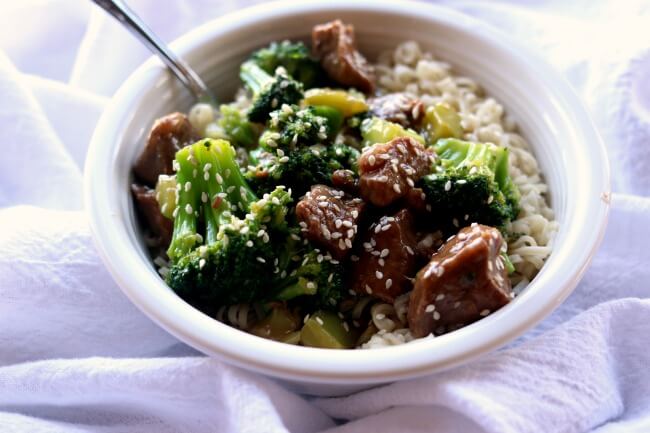 Slow Cooker Beef and Broccoli--tender pieces of beef are served alongside broccoli and a savory and slightly sweet Asian sauce for a homemade version of your favorite Chinese takeout dish.