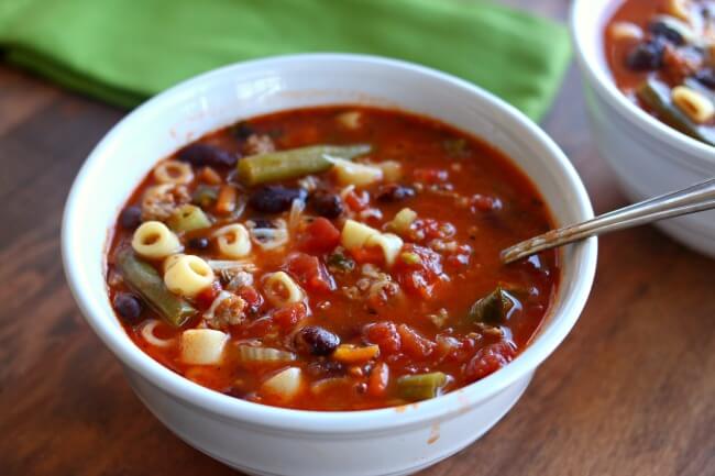 Instant Pot (Ground Turkey) Minestrone Soup--a colorful, healthy and brightly flavored soup that is full of vegetables, basil, beans, pasta, and ground turkey. Pressure cook this soup quickly and enjoy a warm bowl of deliciousness for dinner.