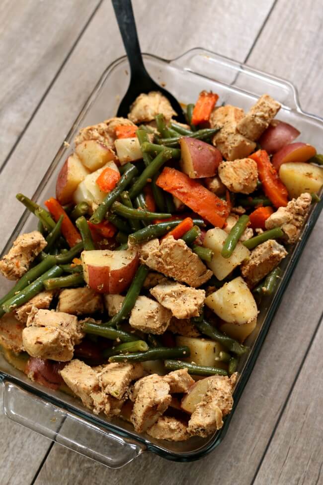 Instant Pot Homestyle Chicken and Vegetables--well seasoned chicken, green beans, red potatoes and carrots are all cooked together quickly in your electric pressure cooker. A true one pot meal that is family friendly, tastes amazing and is so easy to put together.