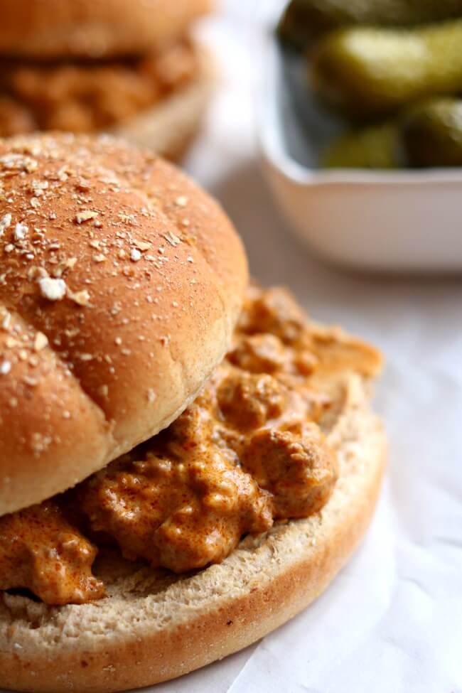 Instant Pot Creamy Sloppy Joes--homemade sloppy joe sauce and ground beef are simmered in the electric pressure cooker and then cream cheese is stirred in as a twist to make the best sloppy joes of your life. Serve the meaty sauce on toasted buns or even slider rolls for an easy weeknight dinner. This recipe can easily be doubled or tripled to serve a crowd. 
