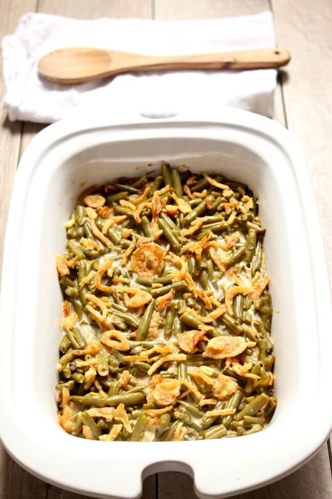 Slow Cooker Green Bean Casserole--a very simple version of your favorite green bean casserole made in the slow cooker. Making this casserole in your slow cooker can free up valuable oven space and also makes this dish very portable.