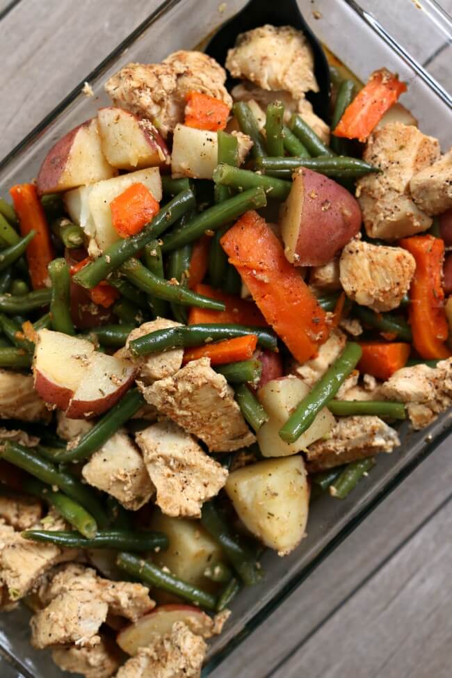 Instant Pot Homestyle Chicken and Vegetables--well seasoned chicken, green beans, red potatoes and carrots are all cooked together quickly in your electric pressure cooker. A true one pot meal that is family friendly, tastes amazing and is so easy to put together.