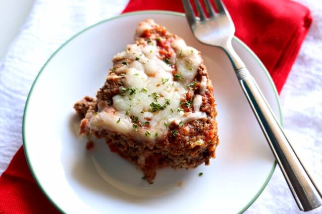 Instant Pot Pepperoni Pizza Meatloaf--a meatloaf made quickly in your electric pressure cooker that is inspired by pepperoni pizza! Mozzarella and diced pepperoni are combined with lean ground beef to make a flavorful combination that kids and adults both love. 