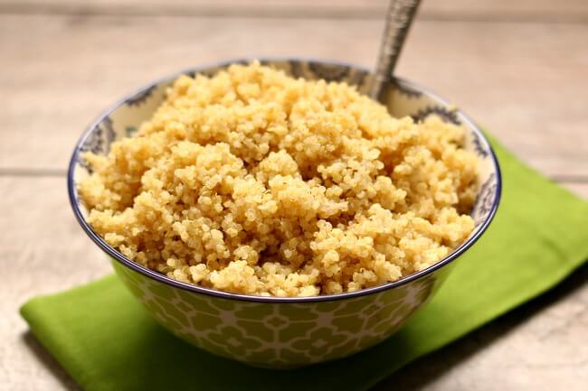 Slow Cooker Quinoa--quinoa is so easy to make in your slow cooker! There's no babysitting or boiling over. Make a big batch of quinoa and store the leftovers in the fridge for various meals during the week!