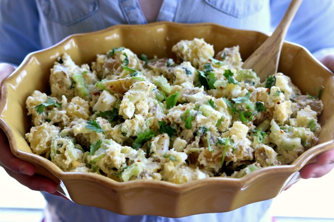 Instant Pot Cilantro Lime Potato Salad--cilantro and a hint of lime create a memorable take on classic potato salad. By cooking the eggs and potatoes together in your Instant Pot you'll cut down on steps, dishes and time! Try this recipe out and you may never go back to regular potato salad again. 