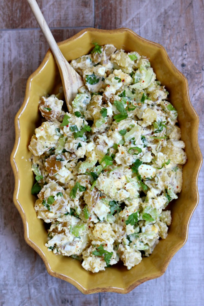 Instant Pot Cilantro Lime Potato Salad--cilantro and a hint of lime create a memorable take on classic potato salad. By cooking the eggs and potatoes together in your Instant Pot you'll cut down on steps, dishes and time! Try this recipe out and you may never go back to regular potato salad again. 