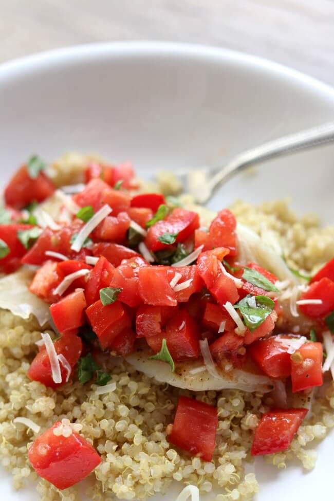 Instant Pot Tomato Basil Tilapia--steamed tilapia is topped with diced tomatoes, olive oil, fresh basil, salt and pepper. This is a light and fresh summer meal that can be prepared and ready to eat in just a few minutes. 